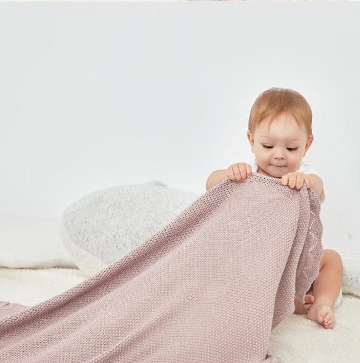 SnuggleBug Knitted Baby Blanket